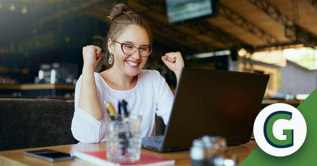 Woman Cheering Laptop
