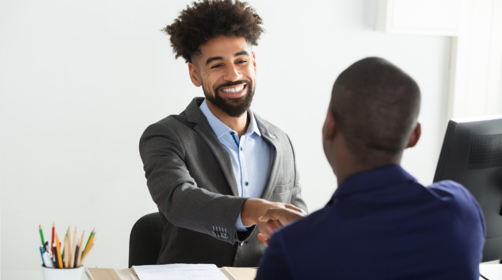 Two-business-men-shaking-hands-client-attracting-candidate-to-job