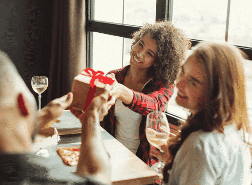 Woman receiving a gift