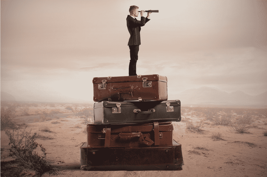 Header graphic - traveling manager standing on suitcases searching for next job