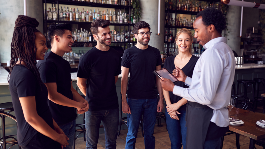 Group of hospitality employees gearing up for a shift